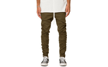 MILITARY GREEN DROP CROTCH STACKED ANKLE ZIP PANT