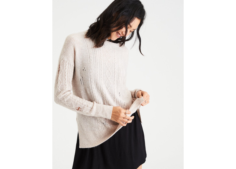 DESTROYED CABLE KNIT SWEATER