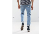 Tapered Jeans In Vintage Light Wash Blue With Heavy Rips