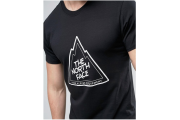The North Face Mountain Line T-Shirt in BlueThe North Face Celebration Logo T-Shirt in Black